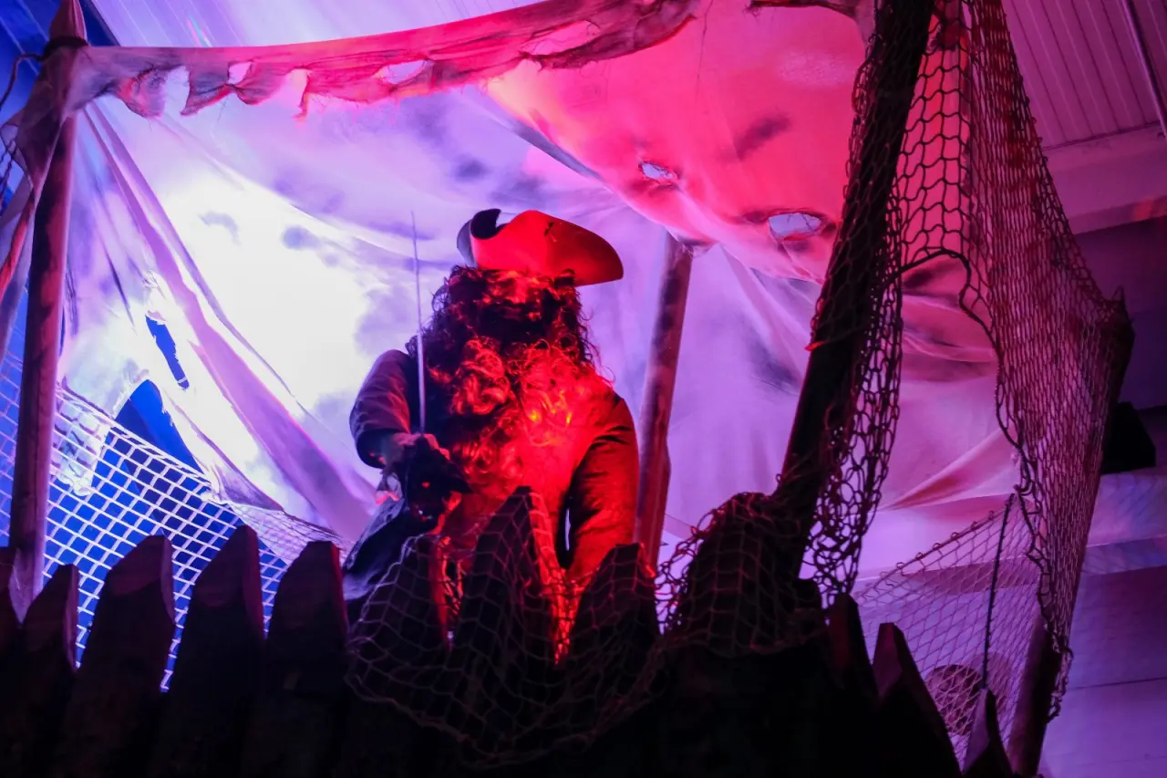 The Long John Silver's Storeroom display, lit in deep red